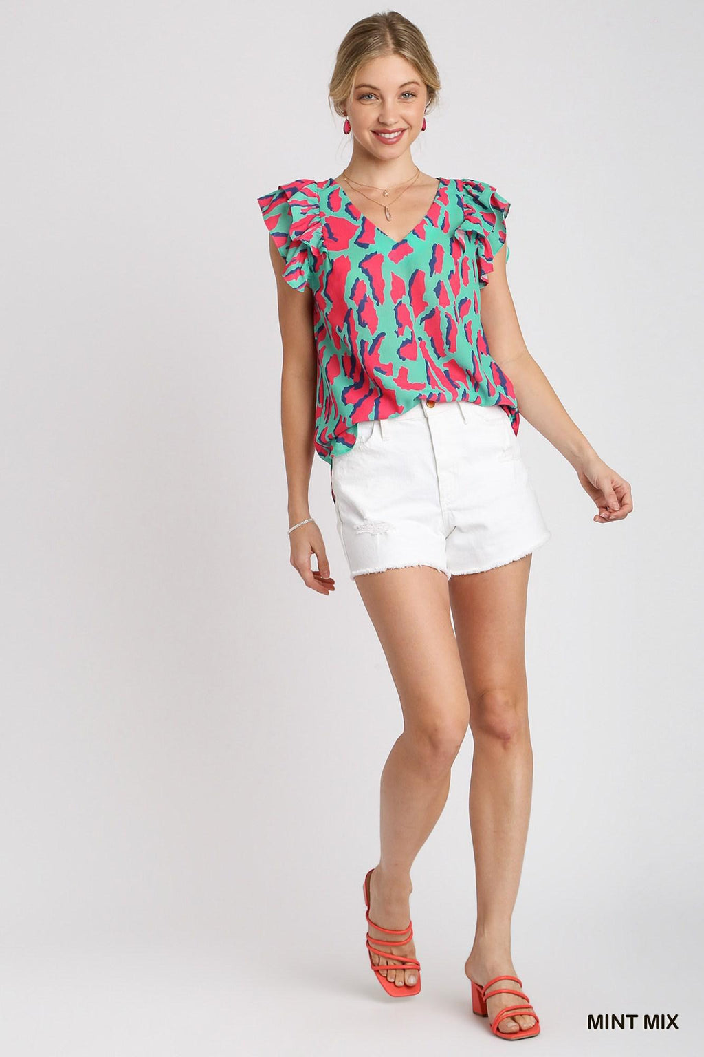 Mint Mixed Abstract V-Neck Top by Umgee